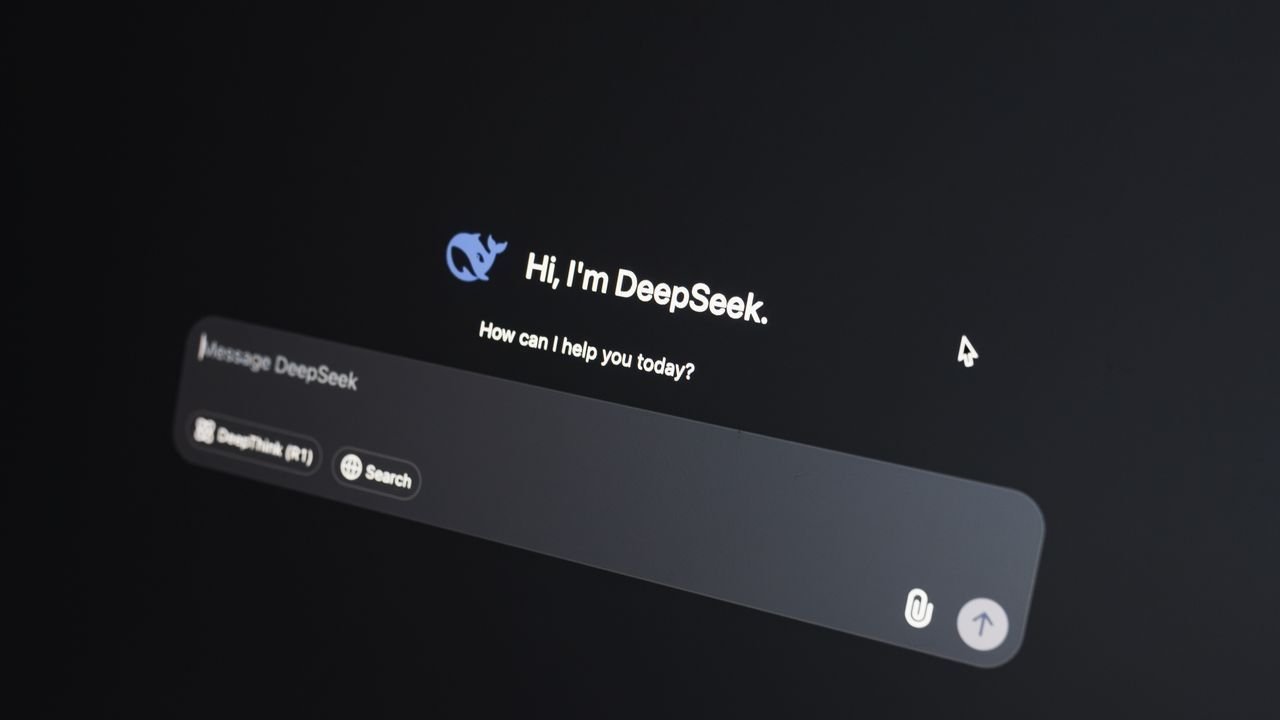 AI chat window with a message box on a dark laptop screen