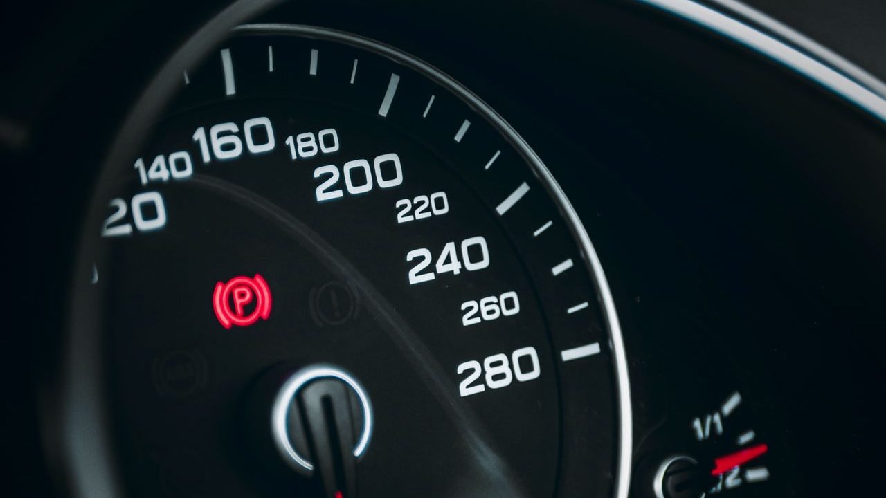 Close-up of a car speedometer used as a symbol for page speed