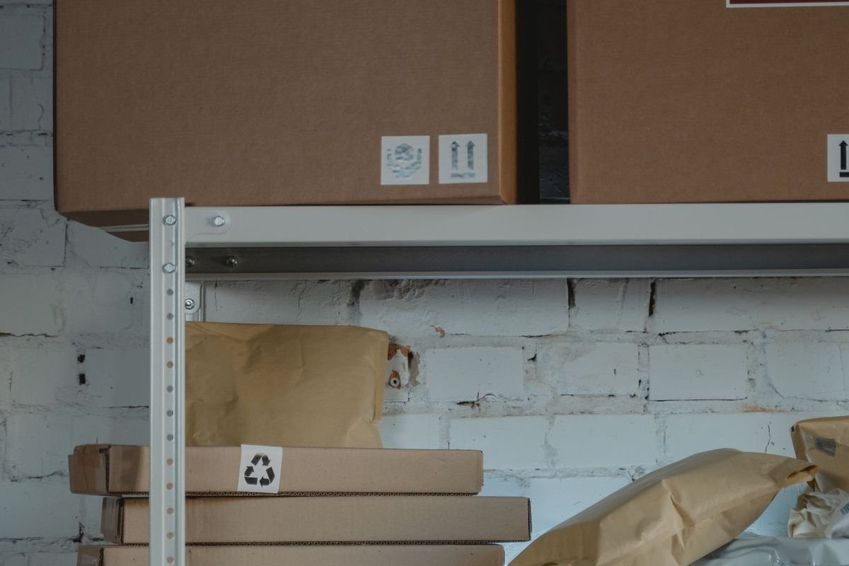 Fragile-labeled boxes on industrial steel shelving