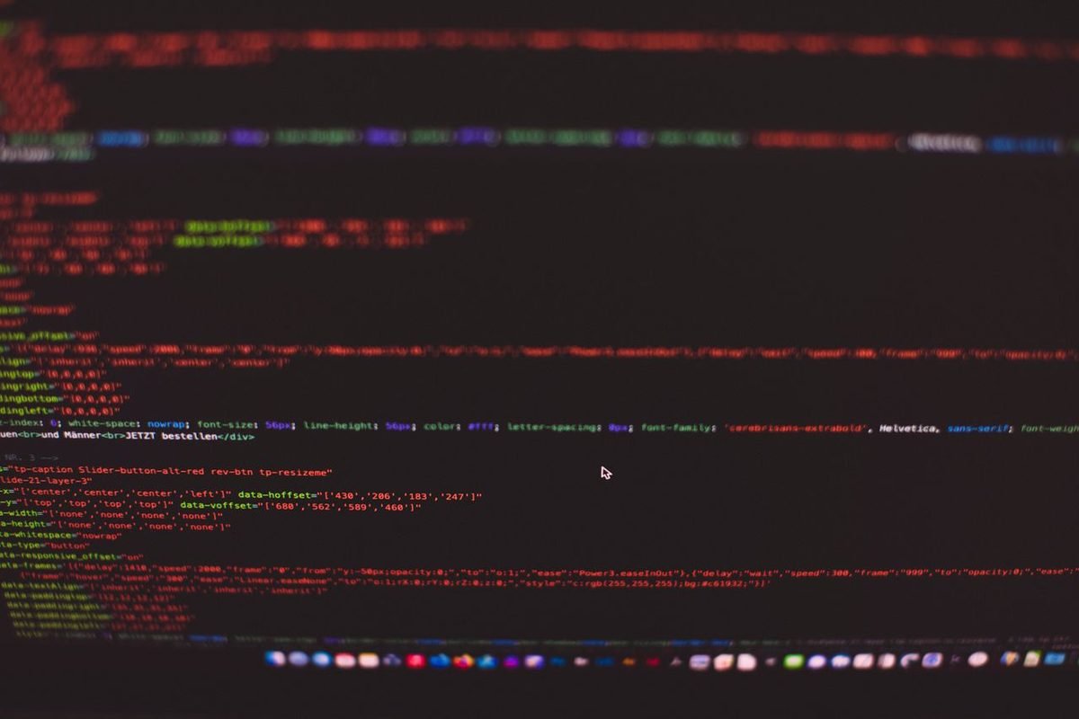 Colorful HTML and CSS code on a dark screen